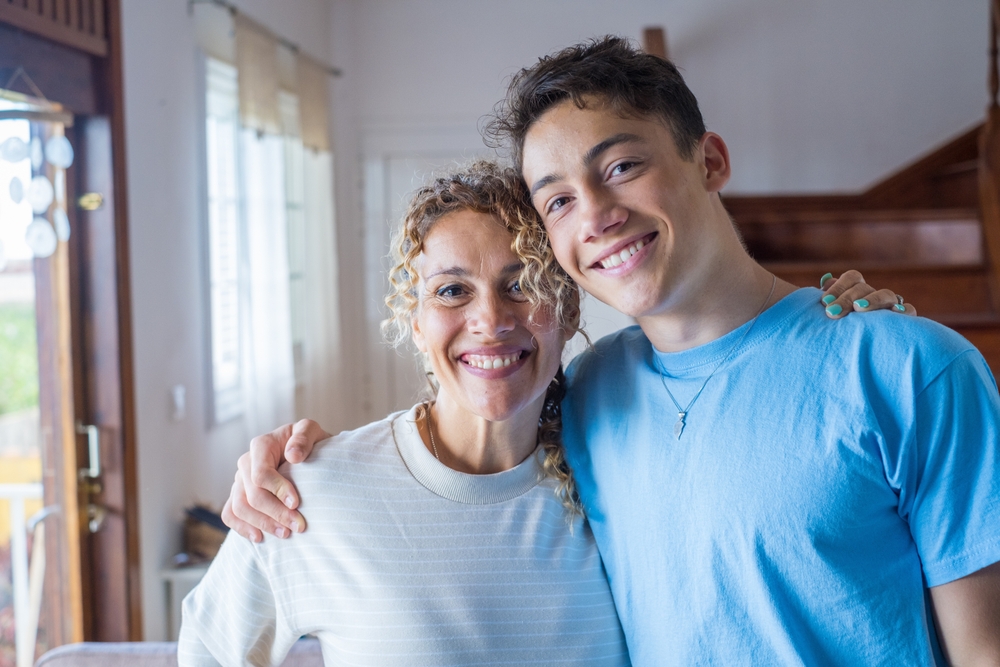 mother and son smiling
