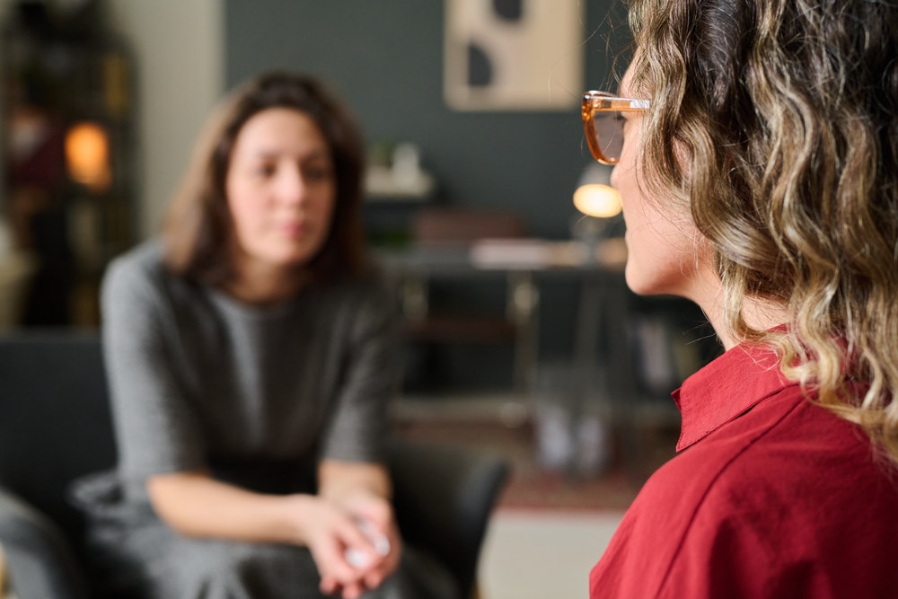 women talking in therapy