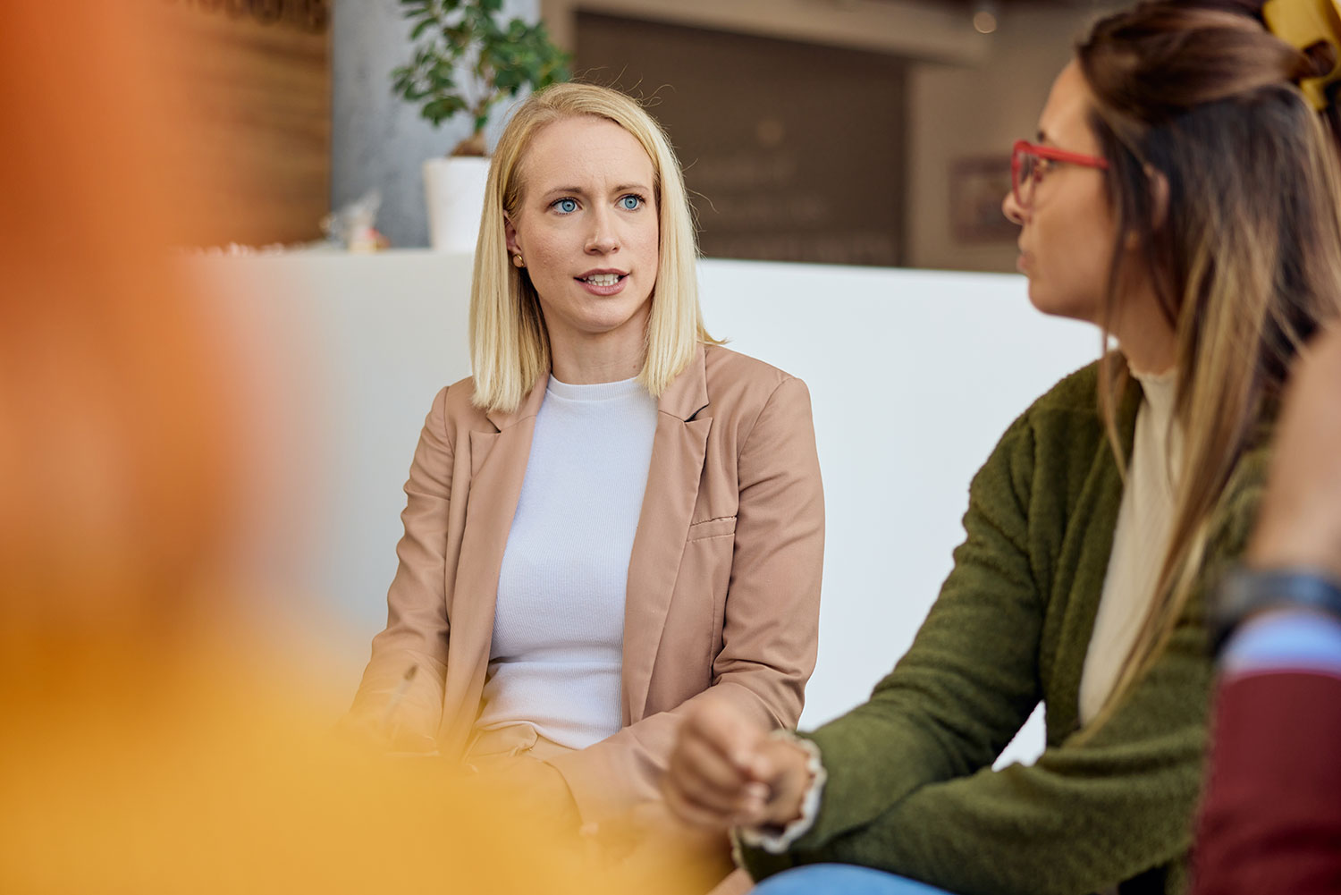blonde woman in therapy circle